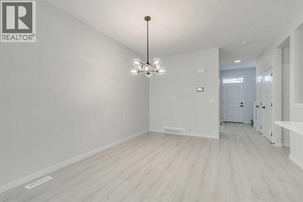 186 Creekside Manor SW, Calgary, Alberta  T2X 6J5 - Photo 10 - A2272147