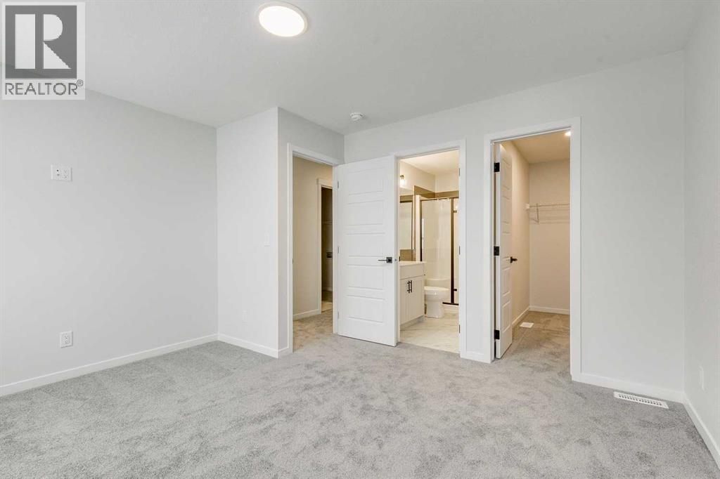 186 Creekside Manor SW, Calgary, Alberta  T2X 6J5 - Photo 22 - A2272147