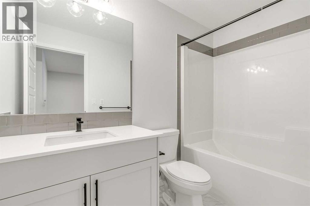 186 Creekside Manor SW, Calgary, Alberta  T2X 6J5 - Photo 29 - A2272147