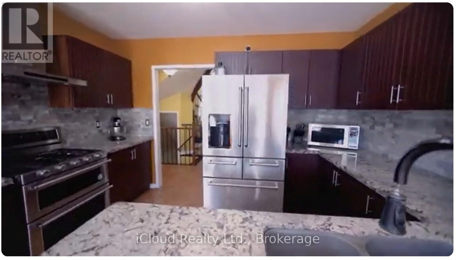 15 Nina Place, Brampton, Ontario  L7A 2E4 - Photo 4 - W12934566