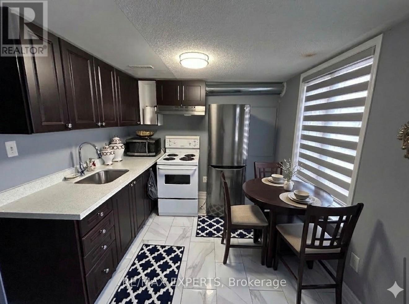 46 Joseph Griffith Lane, Toronto, Ontario  M3L 0C7 - Photo 3 - W12934672