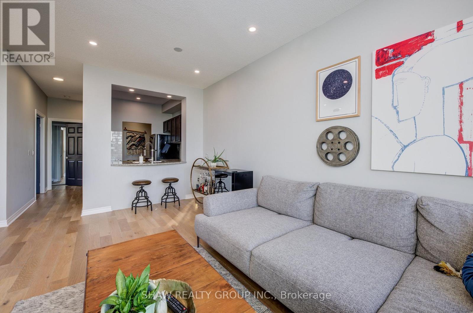 101 - 2379 Central Park Drive, Oakville, Ontario  L6H 0E3 - Photo 2 - W12934696