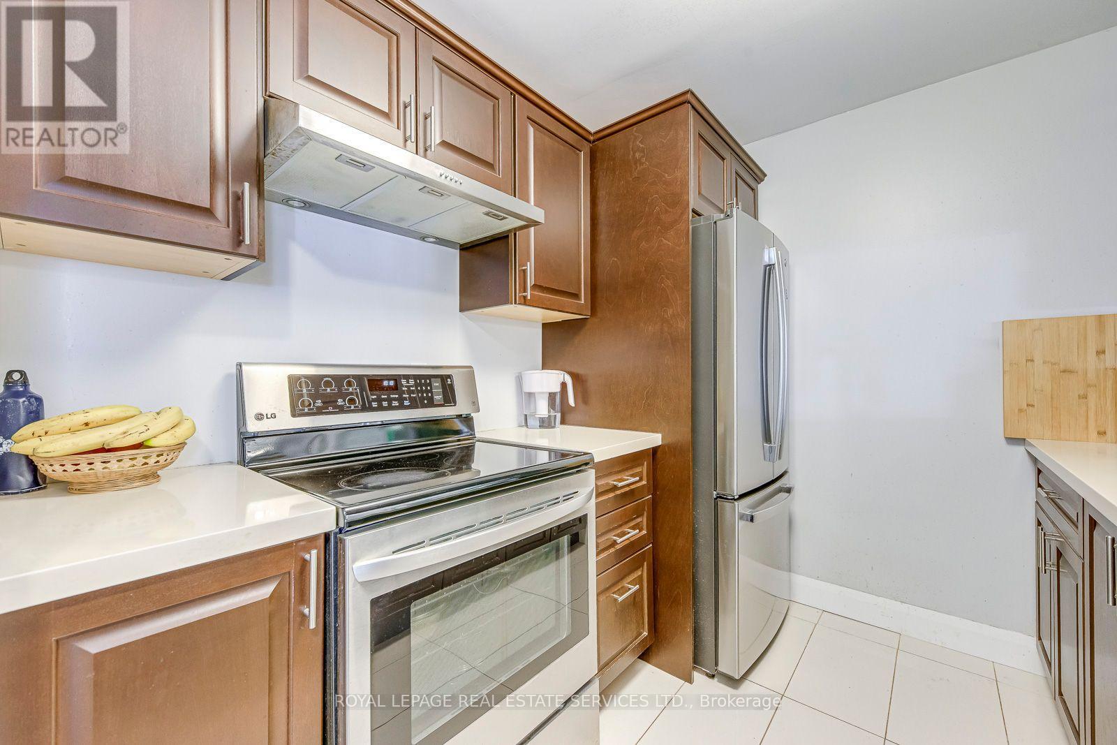 911 - 1450 Glen Abbey Gate, Oakville (Ga Glen Abbey), Ontario  L6M 2V7 - Photo 16 - W12934858