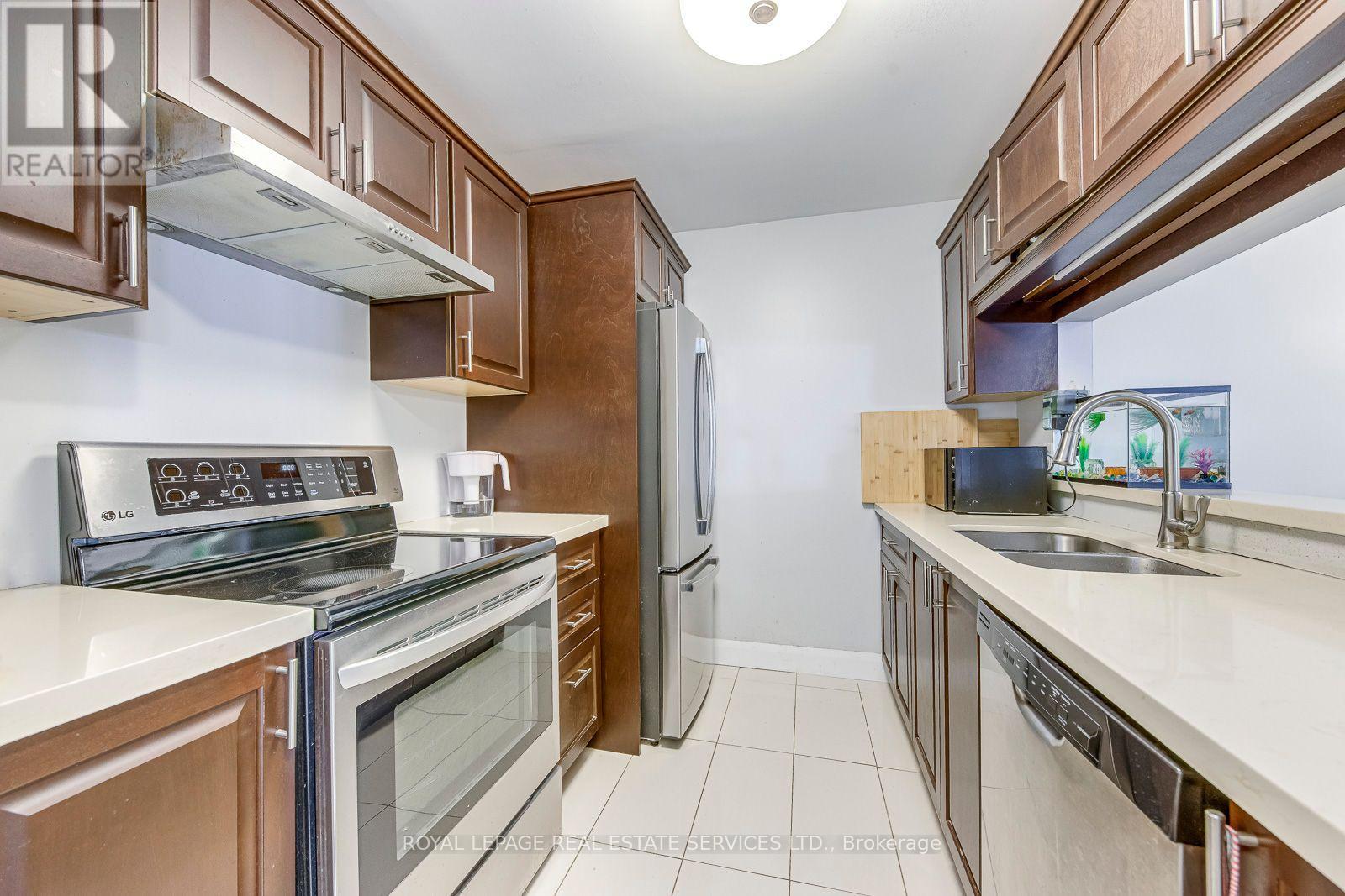 911 - 1450 Glen Abbey Gate, Oakville (Ga Glen Abbey), Ontario  L6M 2V7 - Photo 17 - W12934858