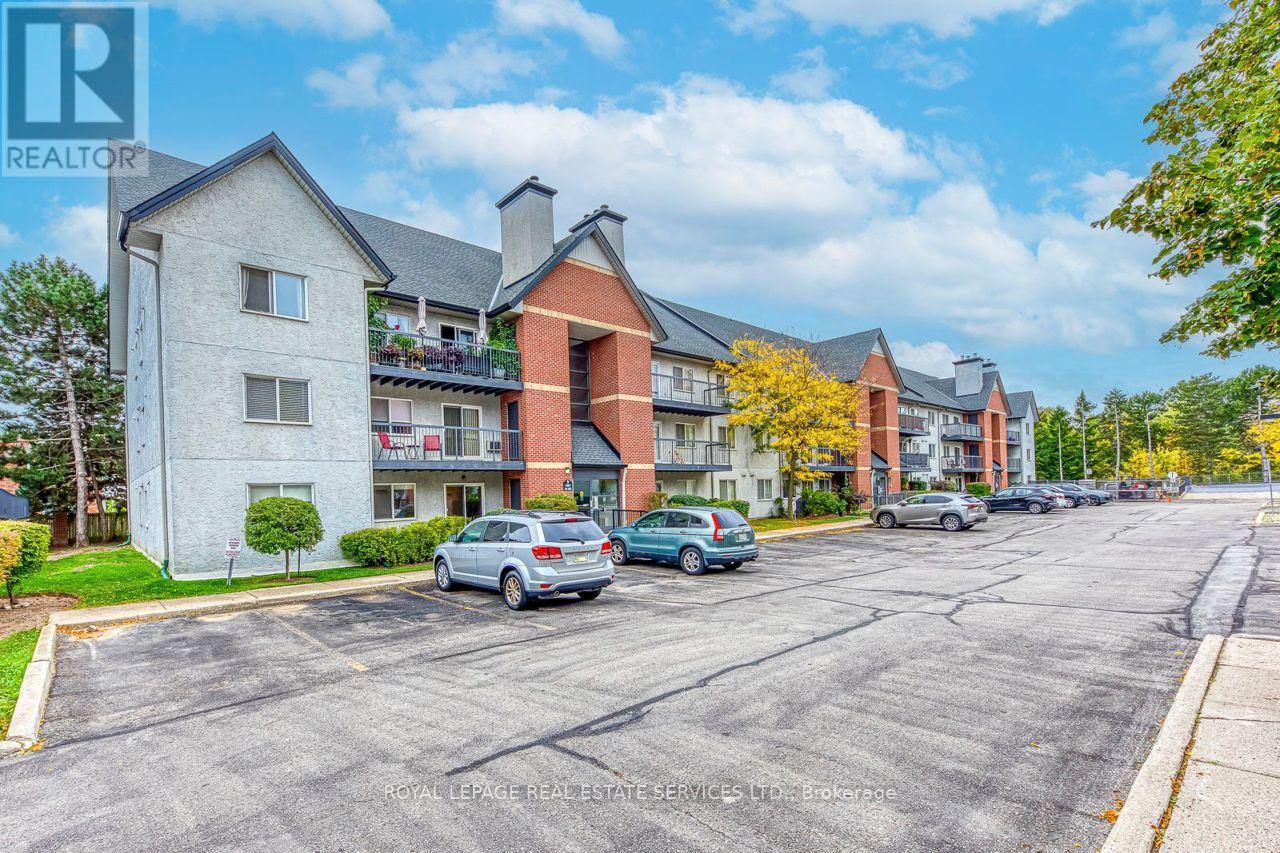 911 - 1450 Glen Abbey Gate, Oakville (Ga Glen Abbey), Ontario  L6M 2V7 - Photo 2 - W12934858