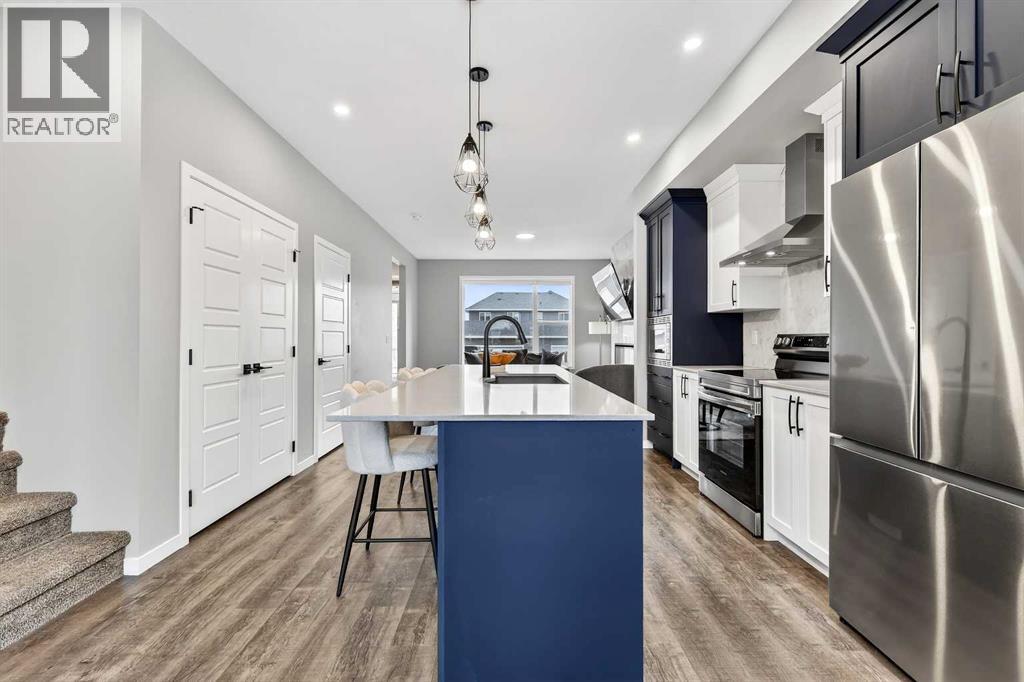 94 Wolf Gate NW, Okotoks, Alberta  T1S 5T9 - Photo 11 - A2296593