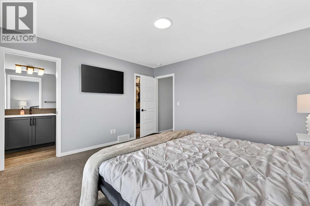 94 Wolf Gate NW, Okotoks, Alberta  T1S 5T9 - Photo 23 - A2296593