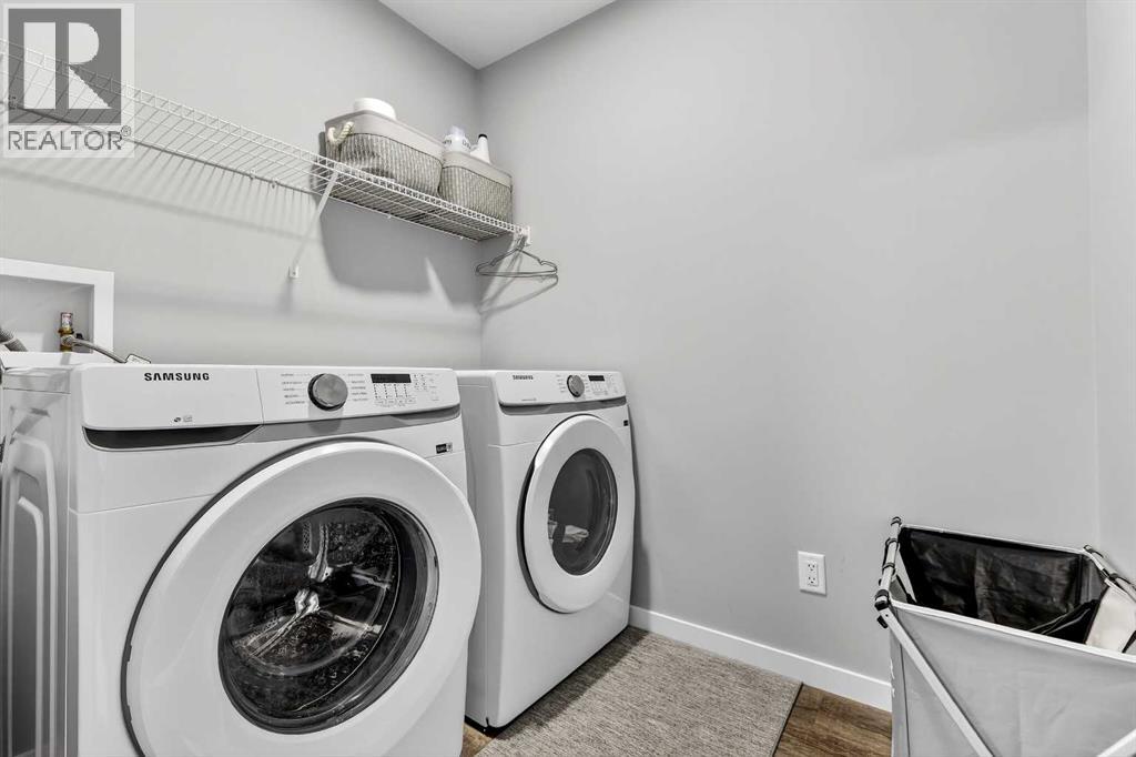 94 Wolf Gate NW, Okotoks, Alberta  T1S 5T9 - Photo 29 - A2296593