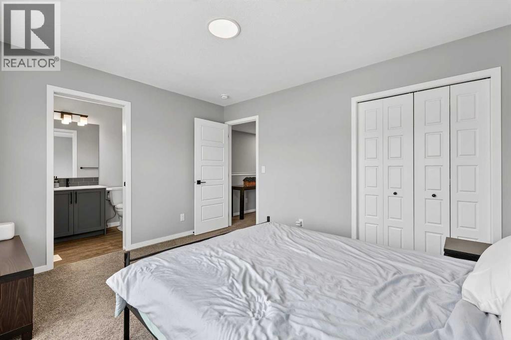 94 Wolf Gate NW, Okotoks, Alberta  T1S 5T9 - Photo 27 - A2296593