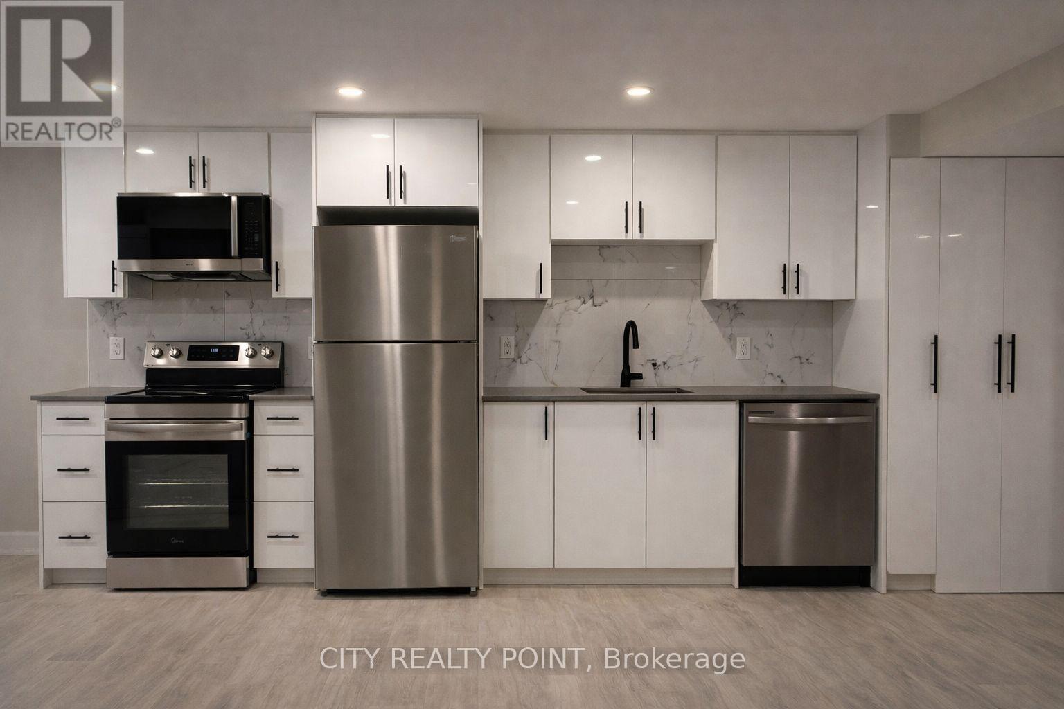 Unit 1 - 131 Camelia Avenue, Ottawa, Ontario  K1K 2X5 - Photo 3 - X12935110