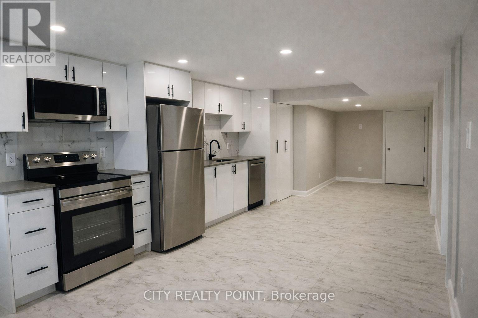 Unit 1 - 131 Camelia Avenue, Ottawa, Ontario  K1K 2X5 - Photo 4 - X12935110