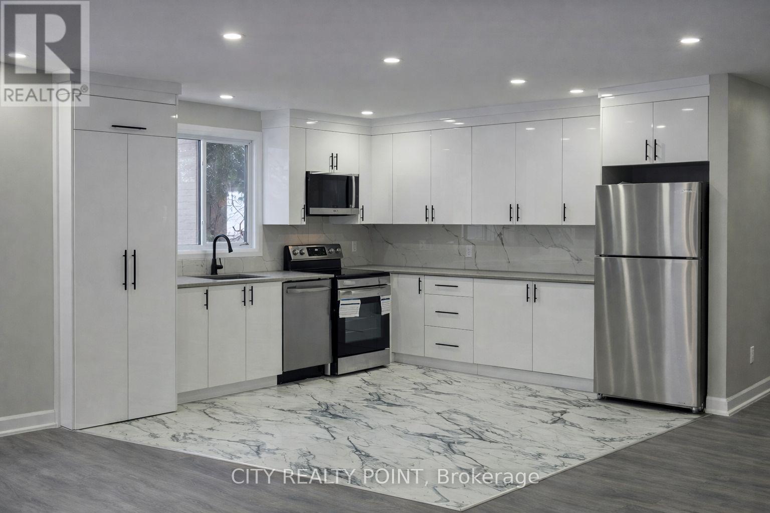 Unit 2 - 131 Camelia Avenue, Ottawa, Ontario  K1K 2X5 - Photo 2 - X12935162