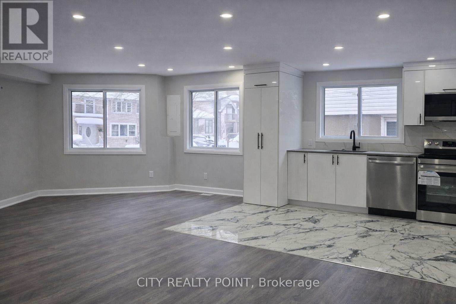 Unit 2 - 131 Camelia Avenue, Ottawa, Ontario  K1K 2X5 - Photo 3 - X12935162