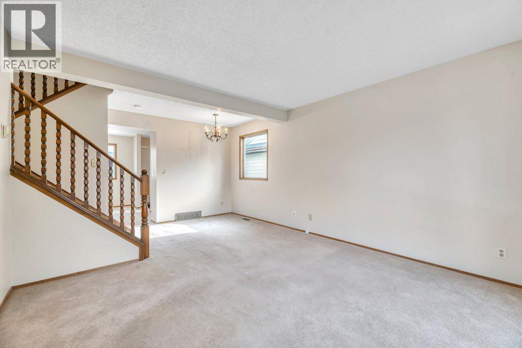 56 Cedarwood Hill SW, Calgary, Alberta  T2W 3H5 - Photo 9 - A2291326