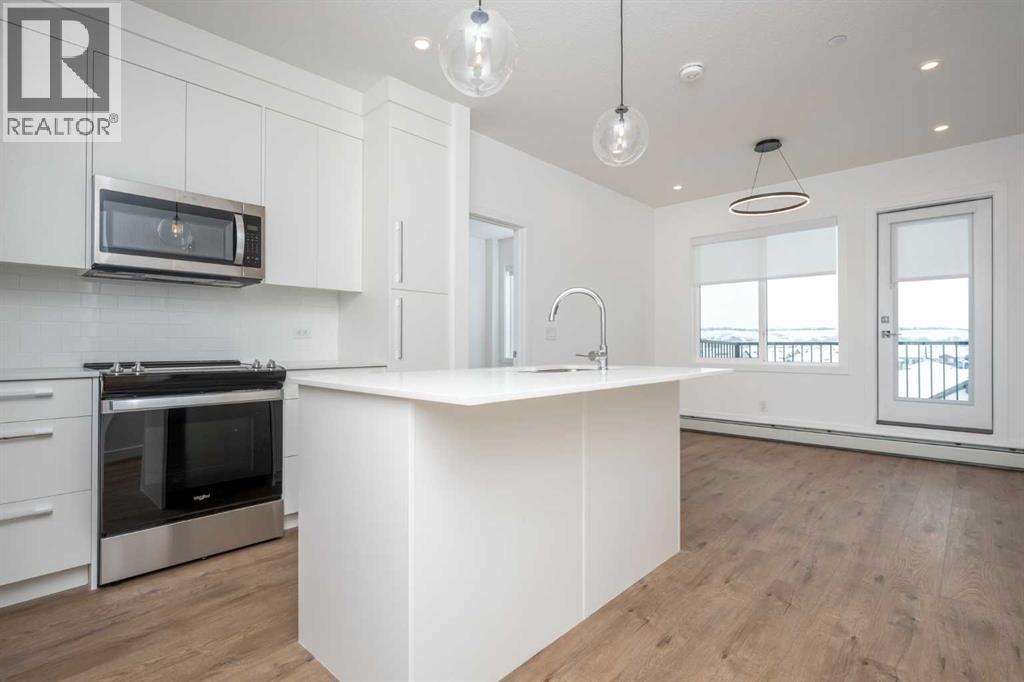 1406, 111 Wolf Creek Drive Se, Calgary, Alberta  T2X 5X2 - Photo 5 - A2285158