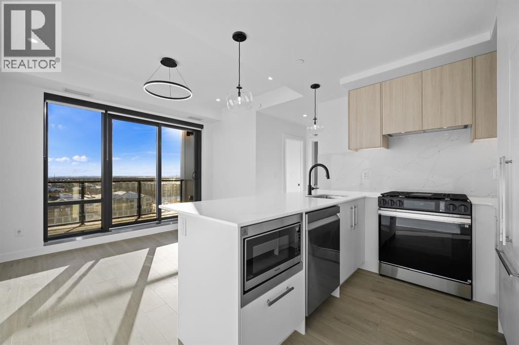 701, 8375 Broadcast Avenue Sw, Calgary, Alberta  T3H 6L3 - Photo 1 - A2278134