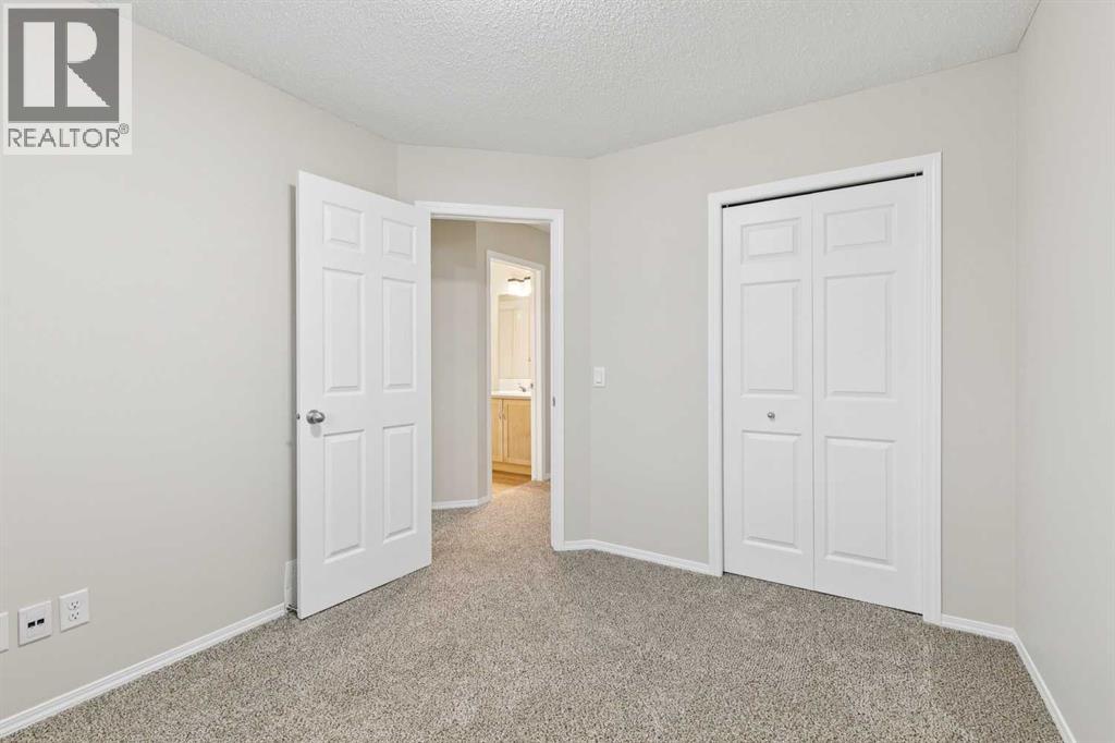 475 Cimarron Boulevard, Okotoks, Alberta  T1S 0J6 - Photo 22 - A2293283