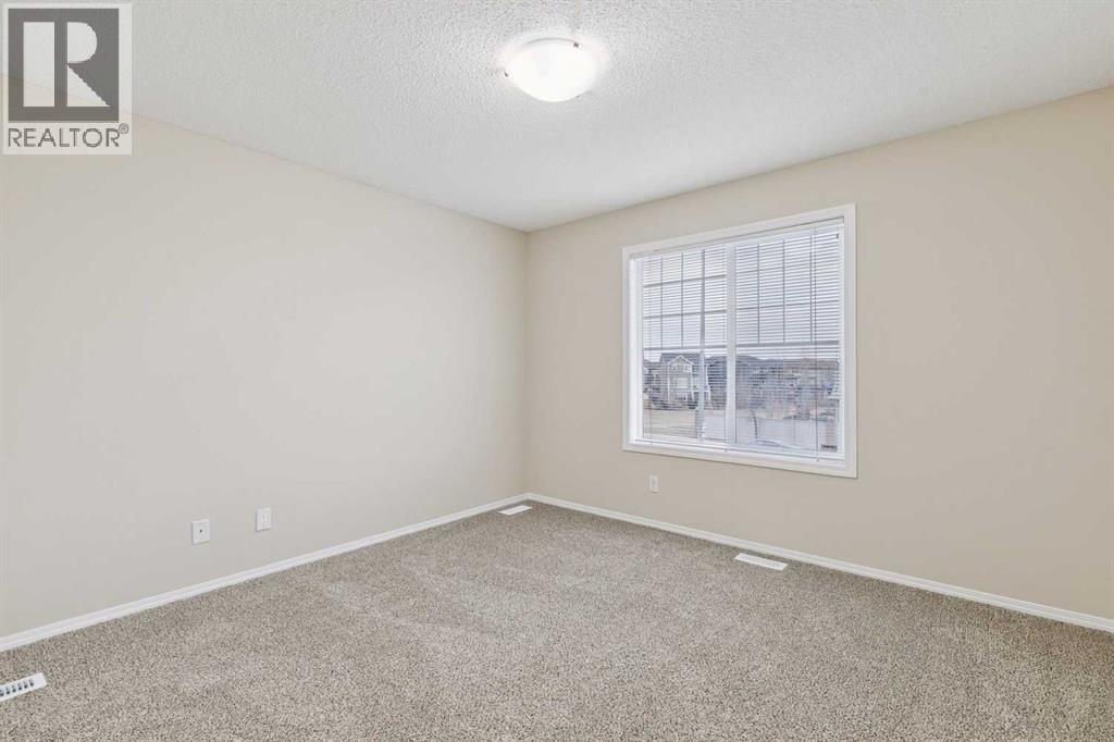 475 Cimarron Boulevard, Okotoks, Alberta  T1S 0J6 - Photo 18 - A2293283