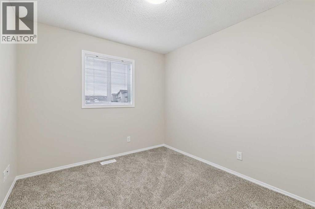 475 Cimarron Boulevard, Okotoks, Alberta  T1S 0J6 - Photo 23 - A2293283