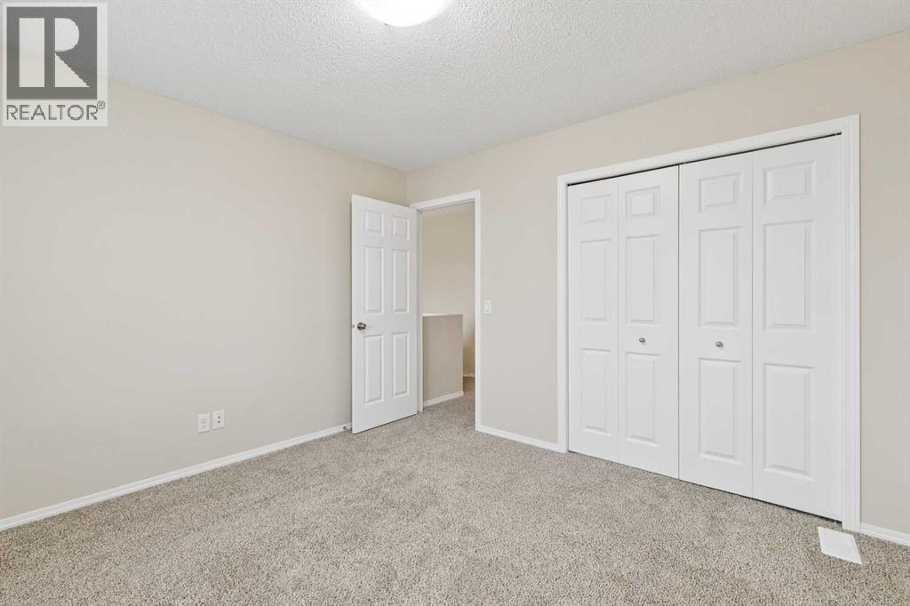 475 Cimarron Boulevard, Okotoks, Alberta  T1S 0J6 - Photo 20 - A2293283