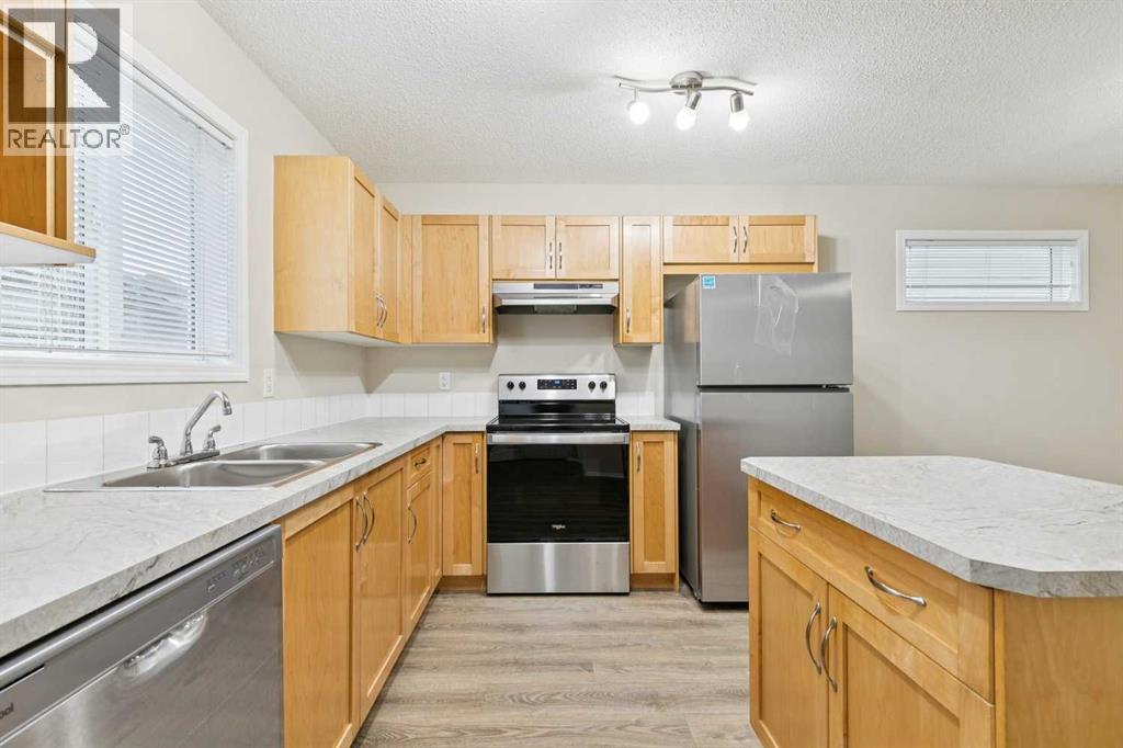 475 Cimarron Boulevard, Okotoks, Alberta  T1S 0J6 - Photo 15 - A2293283