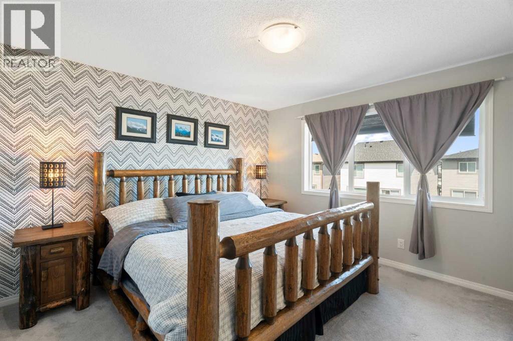 217 Buckskin Way, Cochrane, Alberta  T4C 2R7 - Photo 5 - A2290451