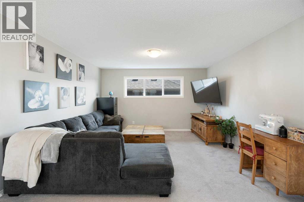 217 Buckskin Way, Cochrane, Alberta  T4C 2R7 - Photo 6 - A2290451