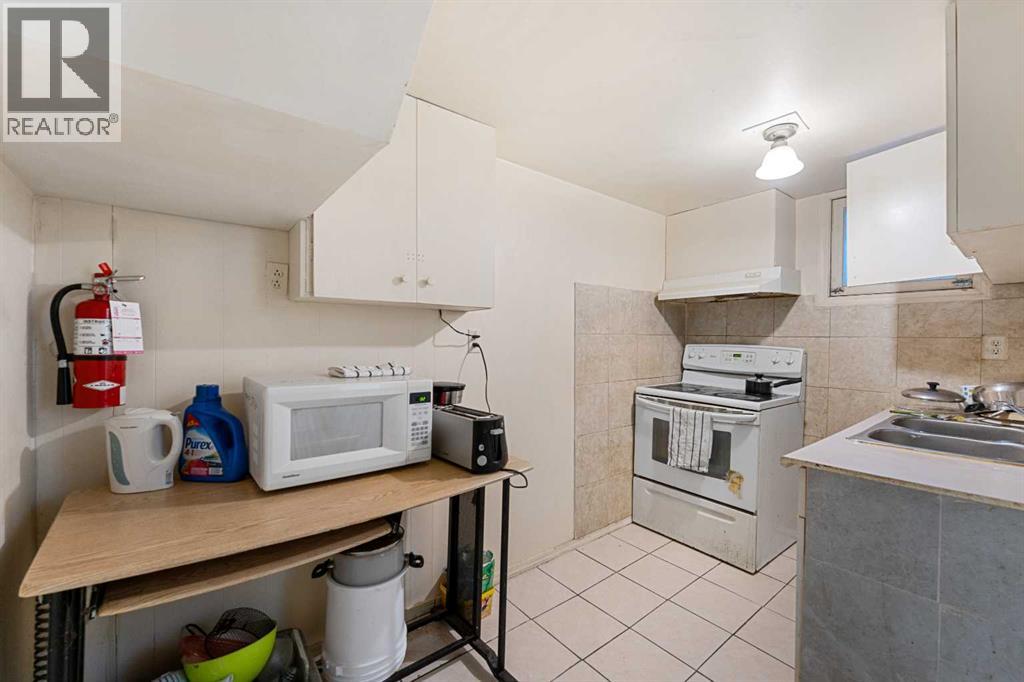 216 15 Avenue NW, Calgary, Alberta  T2M 0G8 - Photo 19 - A2283011