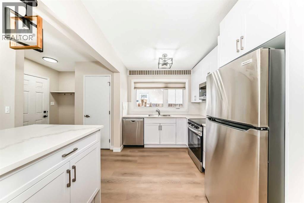 7406-7408 Hunterfield Road Nw, Calgary, Alberta  T2K 4L1 - Photo 9 - A2276447