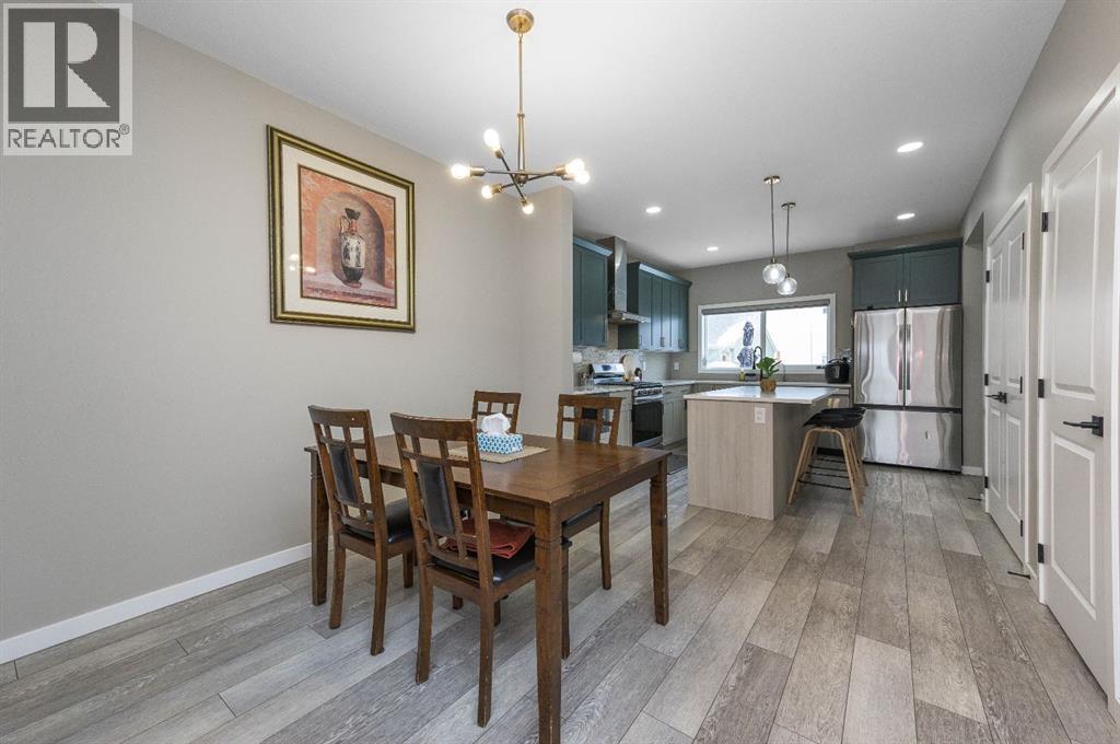 2049 Cobblespring Avenue SW, Airdrie, Alberta  T4B 5M1 - Photo 5 - A2291494