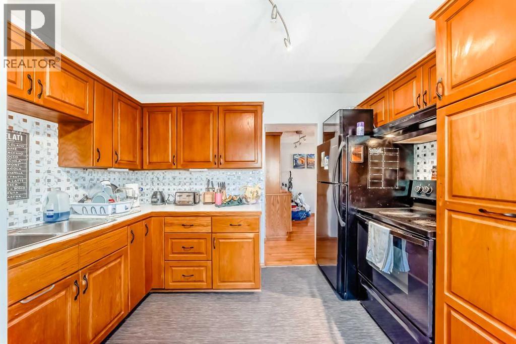 1415 Rosehill Drive Nw, Calgary, Alberta  T2K 1M3 - Photo 3 - A2295667