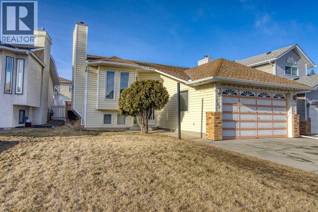 237 Sandarac Drive Nw, Calgary, Alberta  T3K 3W8 - Photo 1 - A2289503