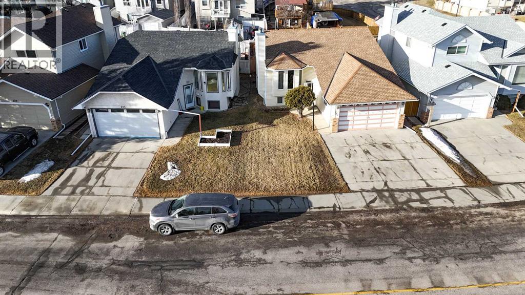 237 Sandarac Drive Nw, Calgary, Alberta  T3K 3W8 - Photo 5 - A2289503