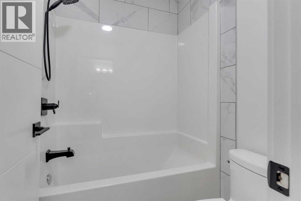 247 Coopers Cove SW, Airdrie, Alberta  T4B 4C3 - Photo 38 - A2294398