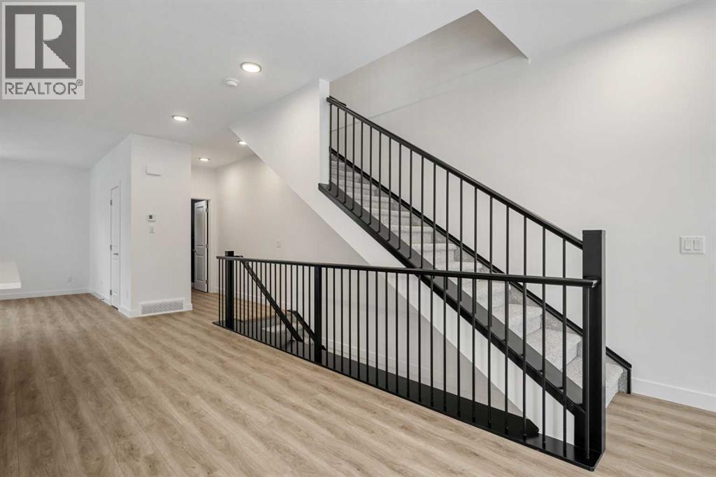 8323 8 Avenue SW, Calgary, Alberta  T3H 6M8 - Photo 12 - A2291355