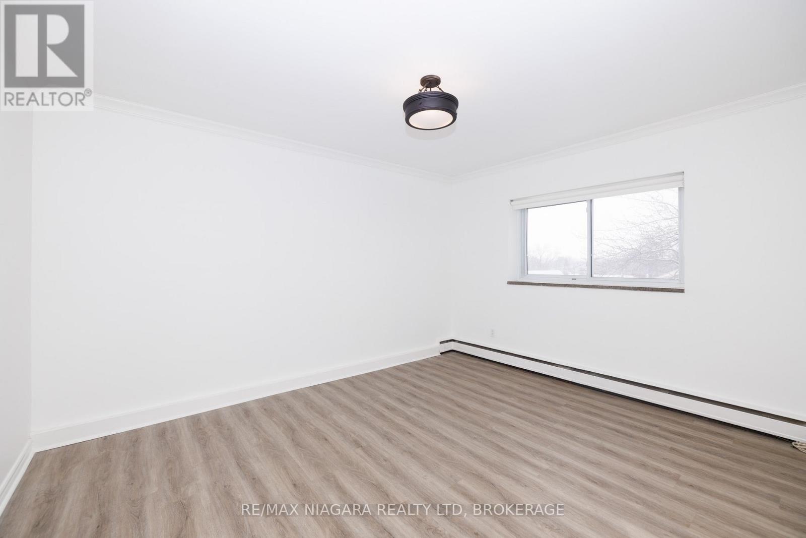 404 - 14 Norris Place, St. Catharines, Ontario  L2R 2W8 - Photo 15 - X12936758