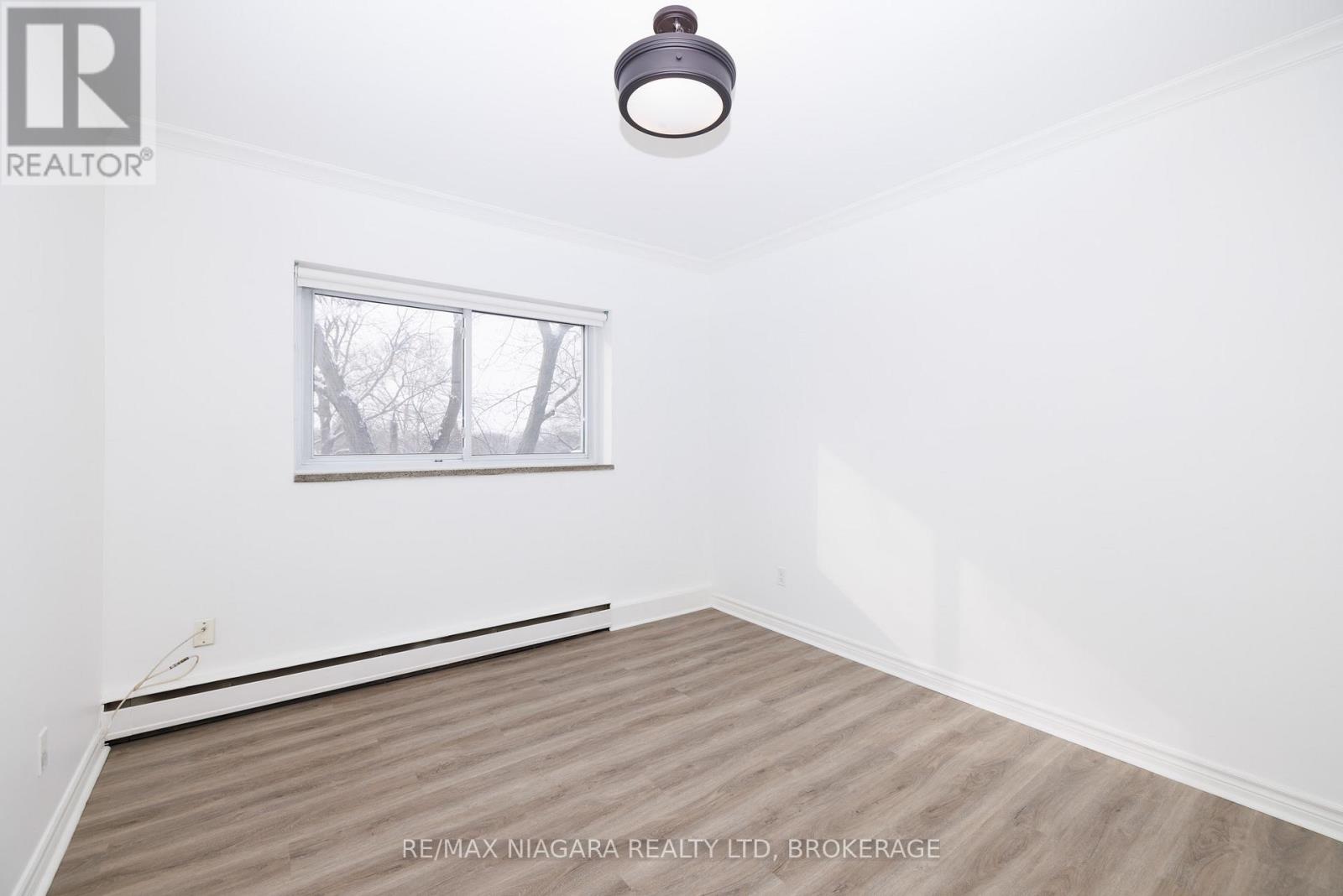 404 - 14 Norris Place, St. Catharines (Downtown), Ontario  L2R 2W8 - Photo 19 - X12936758