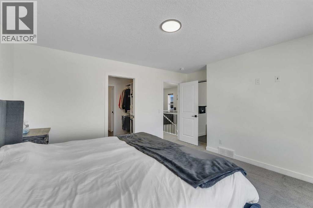 325 Crestmont Drive SW, Calgary, Alberta  T3B 6G9 - Photo 25 - A2294613