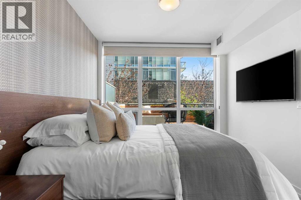 102, 128 2 Street SW, Calgary, Alberta  T2P 0S7 - Photo 11 - A2295856