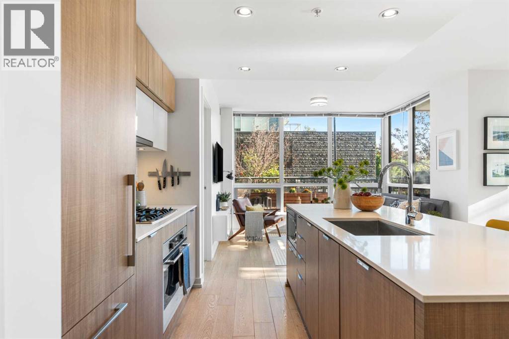 102, 128 2 Street SW, Calgary, Alberta  T2P 0S7 - Photo 5 - A2295856