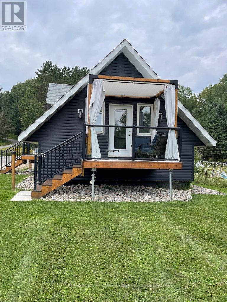 141 Hwy 520 Highway, Armour, Ontario  P0A 1C0 - Photo 3 - X12936874