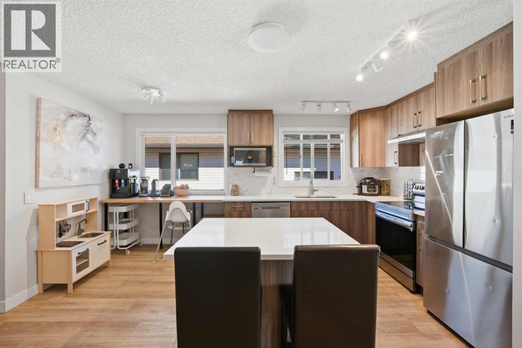 107 Wood Oak Way SW, Calgary, Alberta  T2W 3R3 - Photo 13 - A2295026