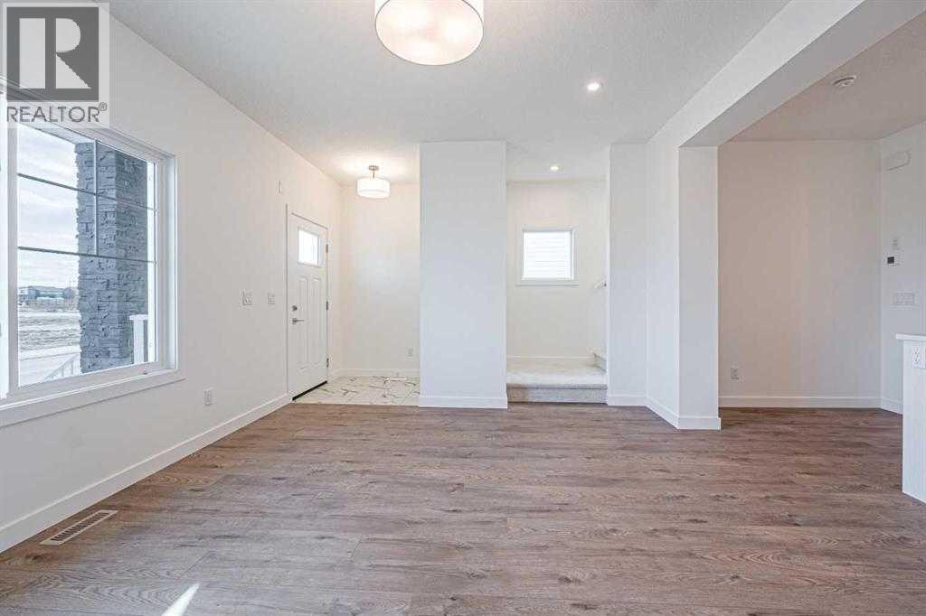 129 Dawson Wharf View, Chestermere, Alberta  T1X 2W3 - Photo 4 - A2293536