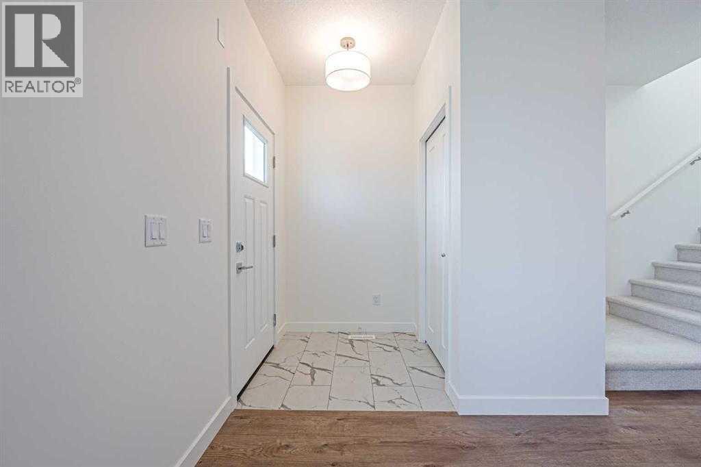 129 Dawson Wharf View, Chestermere, Alberta  T1X 2W3 - Photo 2 - A2293536