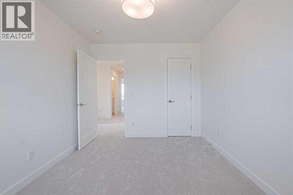 129 Dawson Wharf View, Chestermere, Alberta  T1X 2W3 - Photo 15 - A2293536