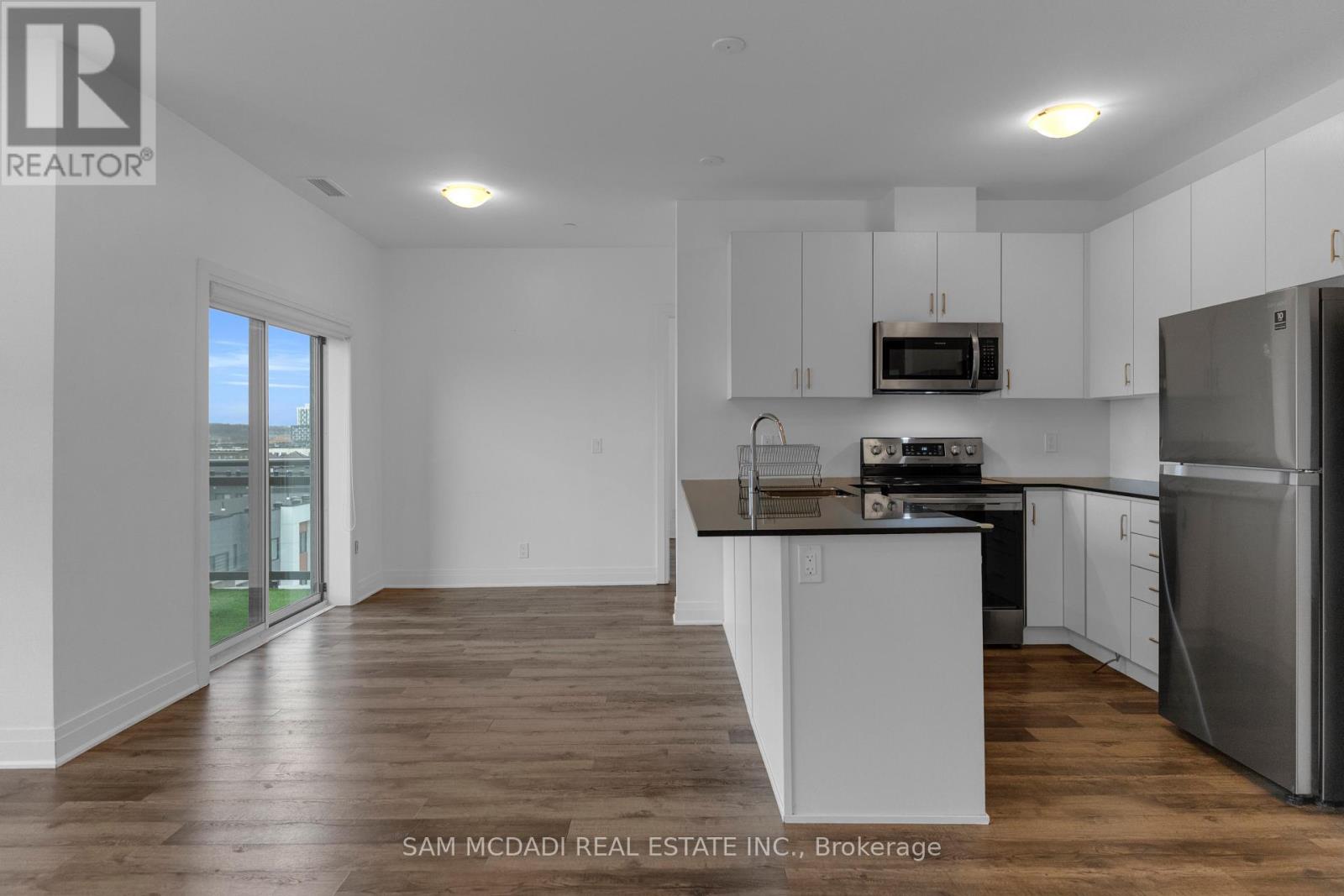 529 - 102 Grovewood Common, Oakville, Ontario  L6H 0X2 - Photo 6 - W12937086