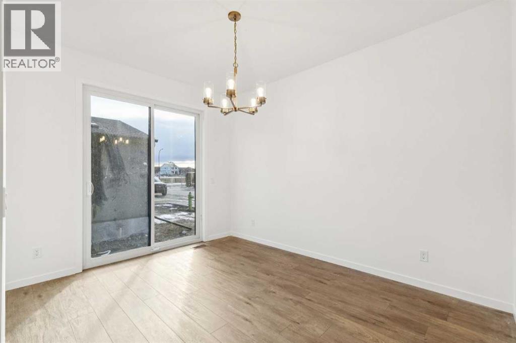 90 Bluerock Hill SW, Calgary, Alberta  T2Y 0V6 - Photo 12 - A2284600