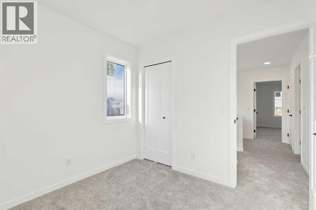 90 Bluerock Hill SW, Calgary, Alberta  T2Y 0V6 - Photo 16 - A2284600