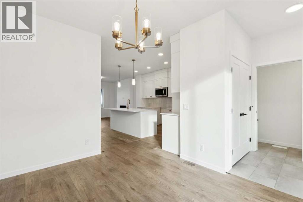 90 Bluerock Hill SW, Calgary, Alberta  T2Y 0V6 - Photo 4 - A2284600