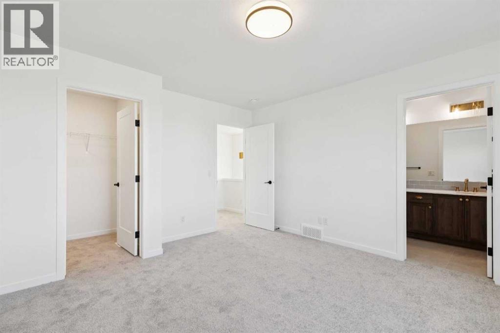 90 Bluerock Hill SW, Calgary, Alberta  T2Y 0V6 - Photo 20 - A2284600